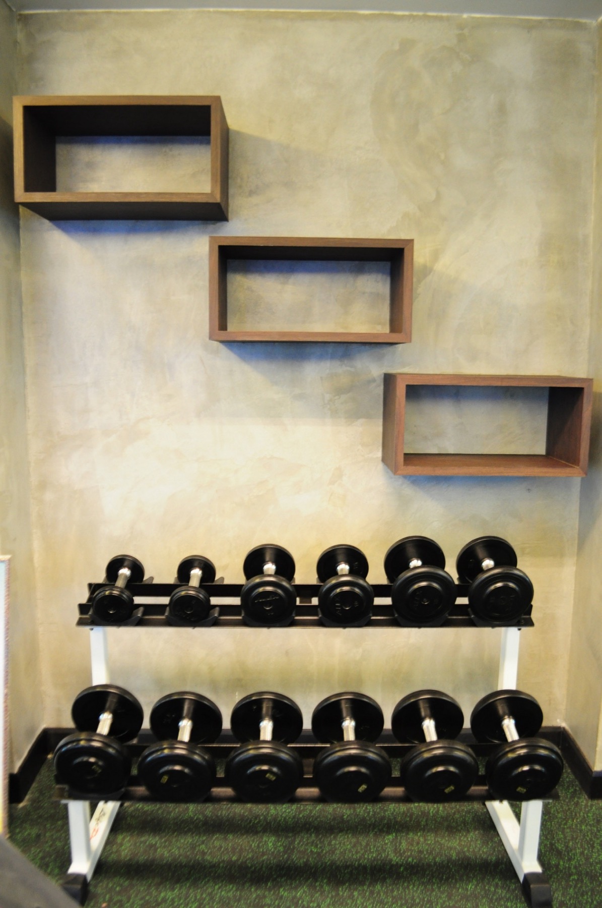 Dumbbell racks inside the fitness room