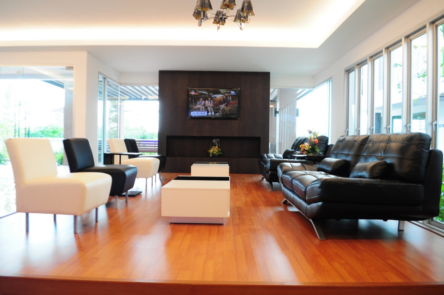 The Porch lobby with sofas, chairs, and a shared seating area