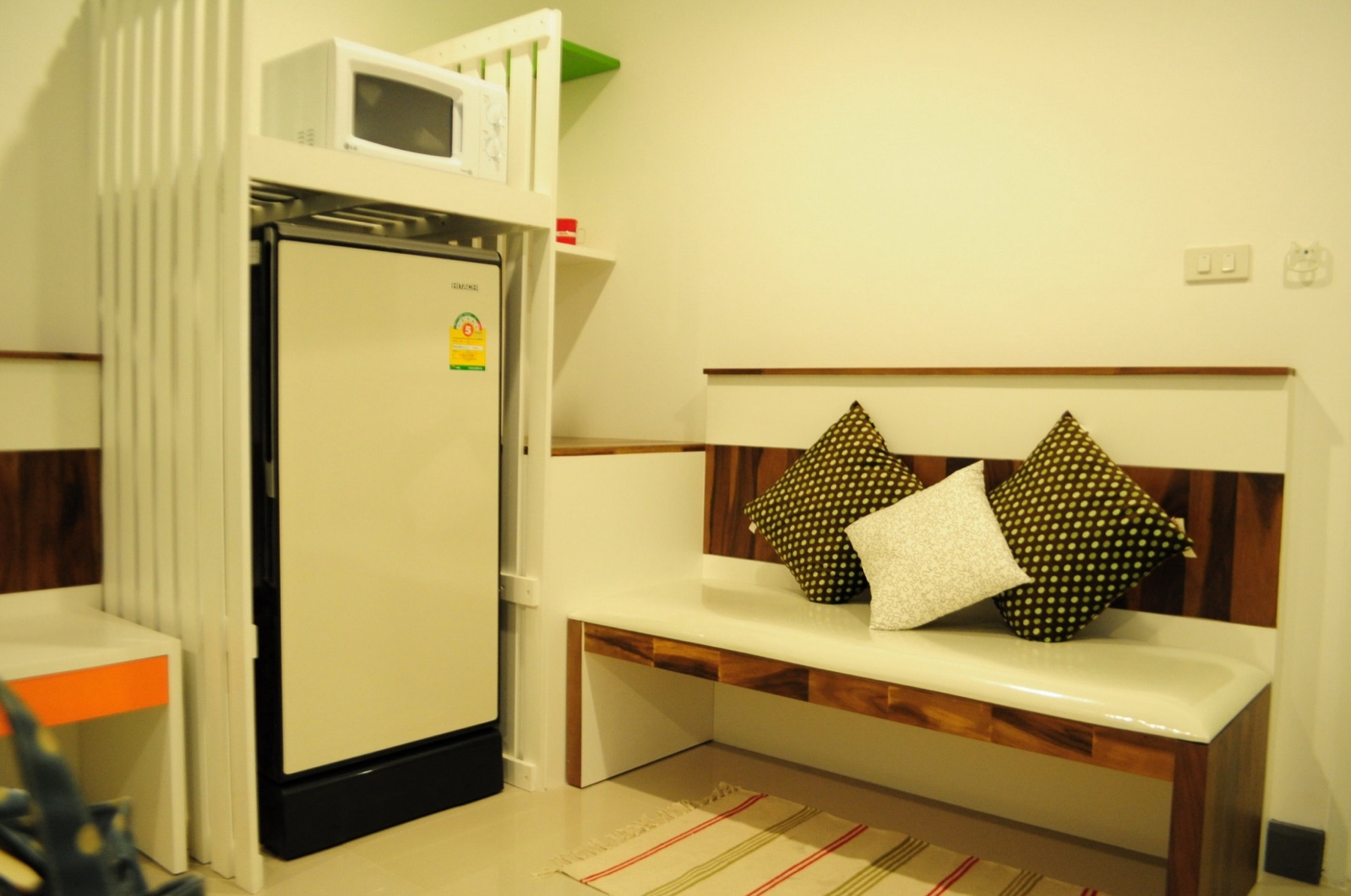 Seating area and refrigerator in the Standard room